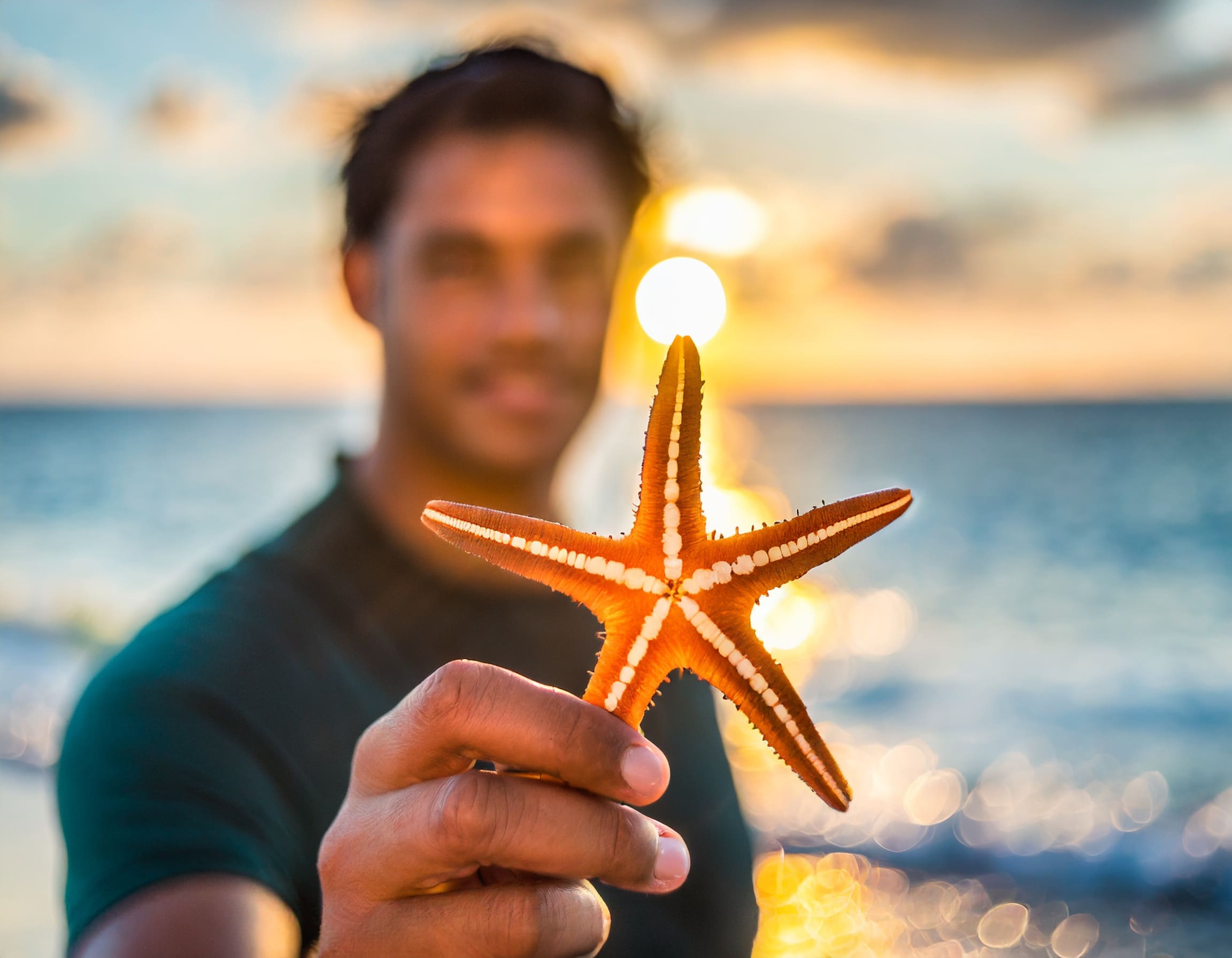 Man holding a starfish